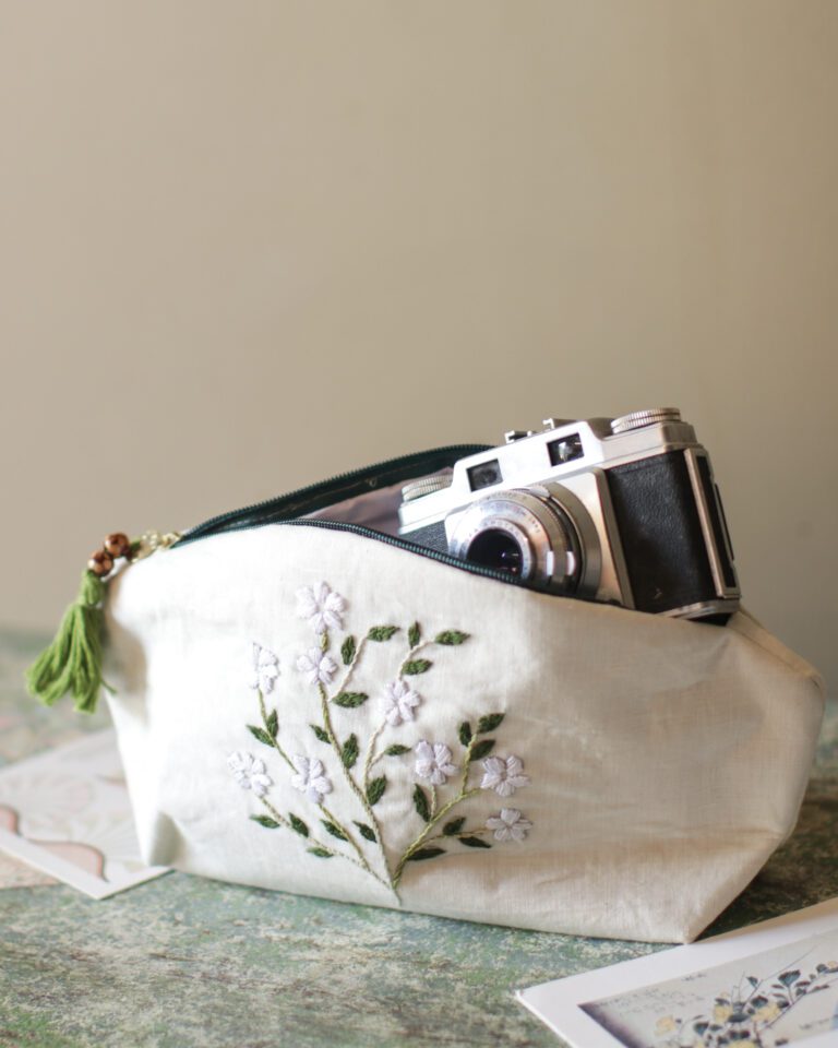 White Embrioded Pouch